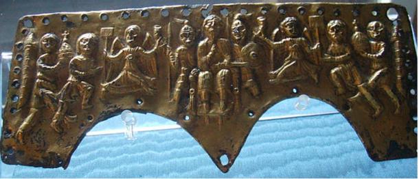 Gilt bronze forehead plate of a lamellar helmet depicting the coronation of King Agilulf, found at Valdinievole, now in the Bargello National Museum, Florence. (I, Sailko/CC BY-SA 3.0)