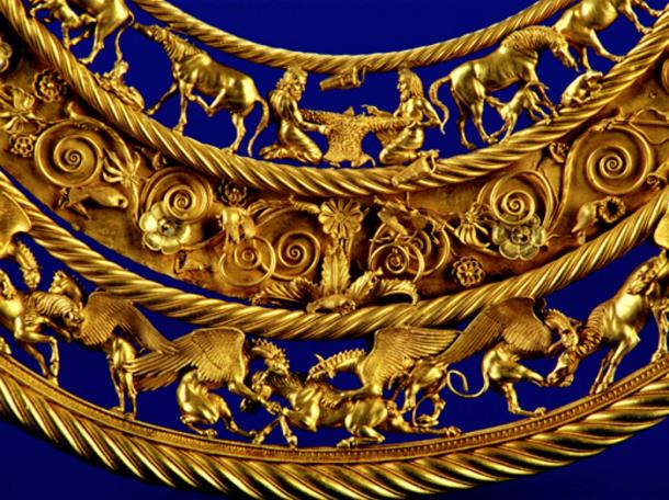 Gold Scythian pectoral, or neckpiece, from a royal kurgan in Tolstaya Mogila, Ordzhonikidze, Ukraine, dated to the second half of the 4th century BC. The central lower tier shows three horses, each being torn apart by two griffins.