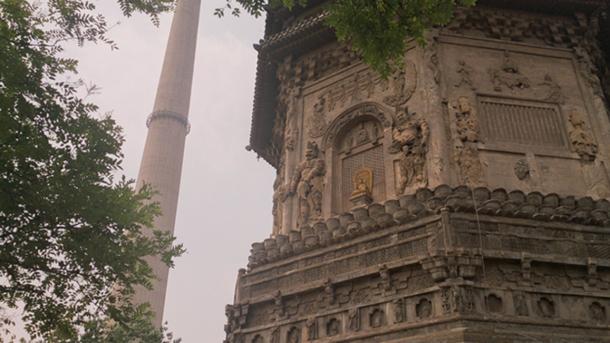 The Liao-period Tianning Temple Pagoda in Beijing, with industrial chimney in background. (Jonathan Dugdale/ Author provided)
