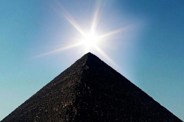 Great Pyramid of Giza in the rays of the sun.