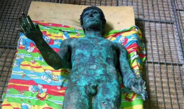 Priceless artifact of Greek god Apollo appeared briefly on eBay laid out on a smurf sheet