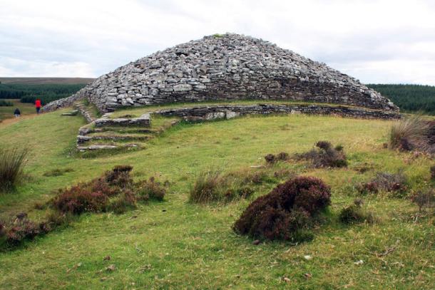 The Grey Cairns of Camster, two ancient Neolithic chambered cairns in Caithness, Scotland, feature complex architecture with central burial chambers accessed via narrow passages. 