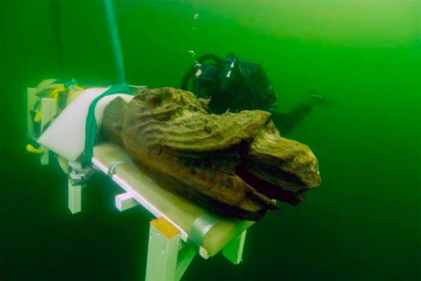 The Gribshunden shipwreck came to media attention when archaeologists salvaged a fabulously well-preserved wooden figurehead of a dragon-like monster from the stern and brought it to the surface. (Blekinge Museum)