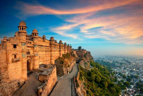 Gwalior Fort, Madhya Pradesh, India. Source: artqu/ Adobe Stock. The fort has existed at least since the 10th century, and the inscriptions and monuments found within what is now the fort campus indicate that it may have existed as early as the beginning of the 6th century. The present-day fort consists of a defensive structure and two main palaces built by Tomar Rajput ruler Man Singh Tomar (reigned 1486–1516 AD).