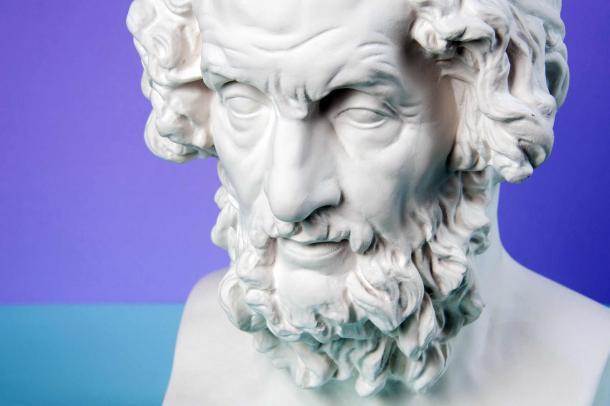 Gypsum copy of ancient statue Homer head on a blue background. (Ded Pixto/Adobe Stock)