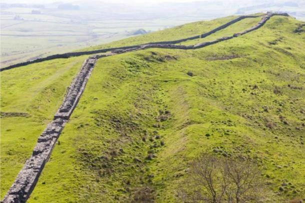 Hadrian’s Wall (Northumberland) stretches for miles over rugged terrain. Source: BigStockPhoto