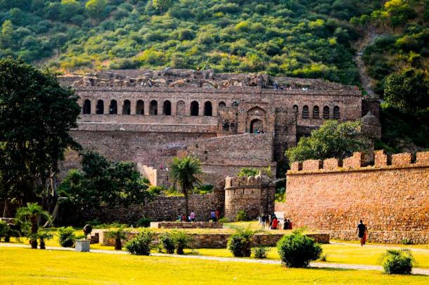 Haunted Place, Bhangarh Fort, Rajasthan, India. Source: dkosta / Adobe Stock. Bhangarh was first established in 1573. The fort, which is actually a small city composed of temples, palaces, and multiple gates, covers a large area of land at the foot of a mountain. It was completely abandoned by 1783. The abandoned fort of Bhangarh is thought to be the most haunted place in India, so much so that the Archaeological Survey of India has forbidden access to the site between sunset and sunrise, and locals have moved their town outside the limits of the fort.
