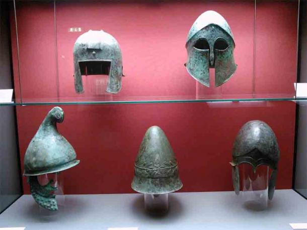 Ancient Greek helmets: Top (from left to right): Illyrian type helmet, Corinthian helmet. Bottom (from left to right): Phrygian type helmet, Pileus, Chalcidian helmet.  (Staatliche Antikensammlungen / CC BY-SA 4.0)