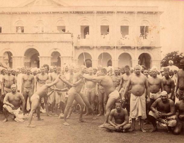 Hyderabadi Peahelwans preparing for Kushti mud wrestling in 1870s India. (Public domain)