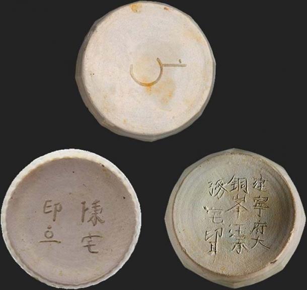 Inscribed box bases from the wreck. (The Field Museum)