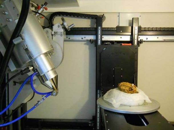Inside the x-ray CT scanner at the Imaging and Analysis Centre, NHM, London. X-ray source on left of image, on the right of image the bundle on turntable behind it is one of the x-ray detector plates. (Iron from the sky project)