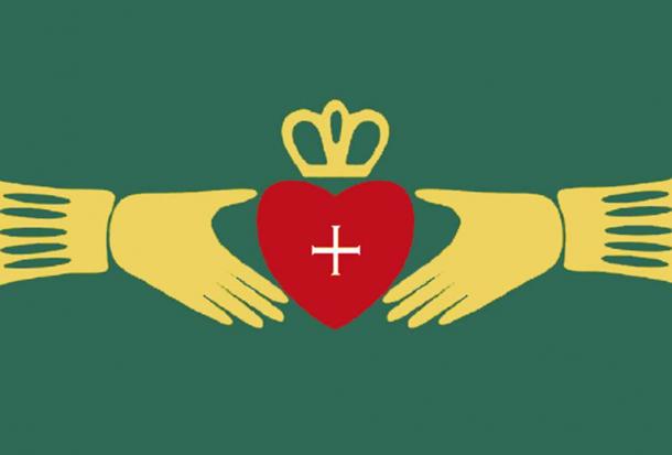 The design of a traditional Irish Claddagh ring symbol on a banner.