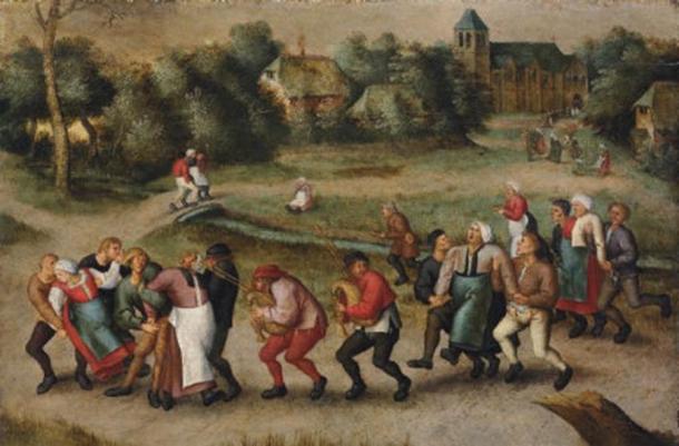 La Danza de San Juan, que se ve aquí en una pintura de 1592 de Pieter Brueghel II, fue un fenómeno social que involucró una especie de manía de la danza que se apoderó de la Europa continental entre los siglos XIV y XVII. (Dominio publico)