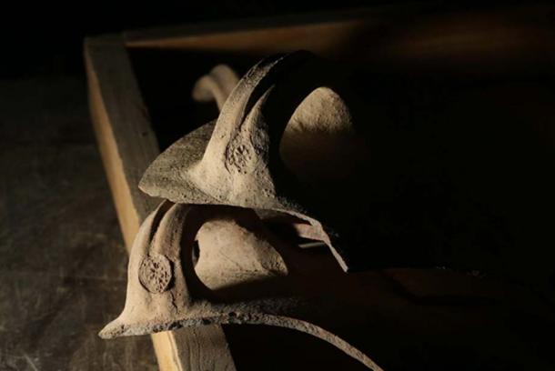 Jug handles with the rosette seal. 