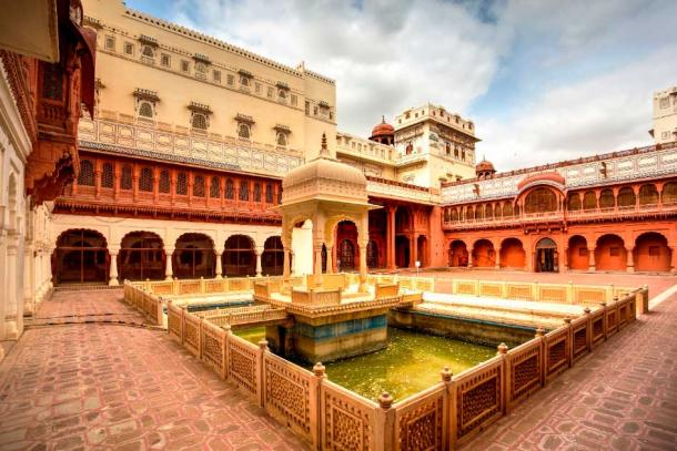 Junagarh Fort, Bikaner, Rajasthan, India. Source: catalinlazar / Adobe Stock.  Junagarh Fort is one of the few major forts in Rajasthan which is not built on a hilltop. The fort complex was built under the supervision of Karan Chand, the Prime Minister of Raja Rai Singh. Construction of the walls and associated moat was completed in 1594 AD.