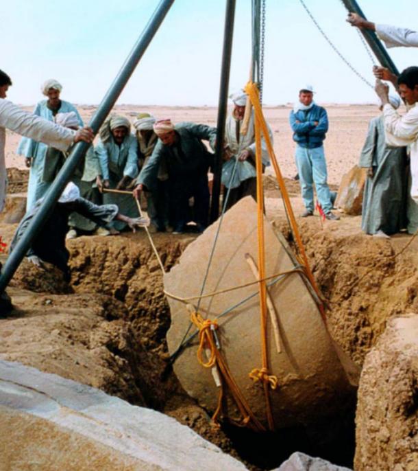 Lifting a table rock from one of the pits.