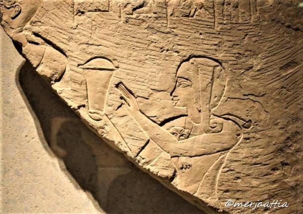 Limestone relief of Crown Prince Thutmose standing behind his father, Amenhotep III, in the role of high priest. Saqqara. Neues Museum, Berlin. (Merja Attia)