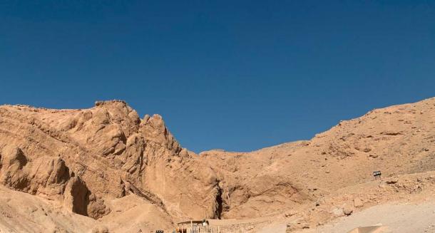 Looking directly at the western end of the main wadi of the Valley of the Queens, where a prominent gorge is visible. This leads to the “Sacred Grotto of Hathor”, an area of pools sacred to the feminine cow goddess Hathor (due to the gorge’s very feminine appearance in the center of the wadi). Could Nefertiti be buried somewhere in this vicinity? (Author’s own photo)