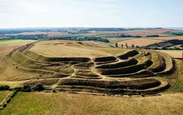 Maiden Castle is an Iron Age hillfort in Dorset, England, dates from 4000 BC. (David Matthew Lyons/Adobe Stock)