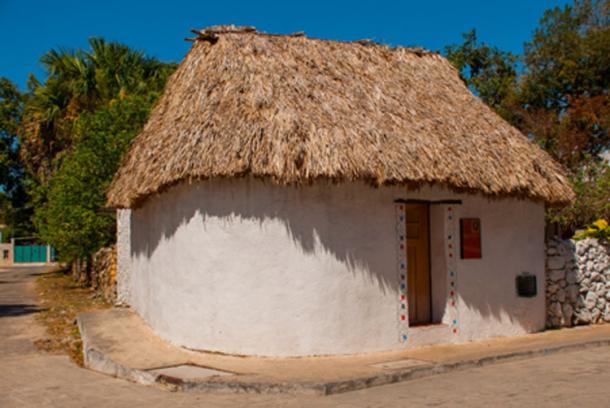 Many Maya on Mexico’s Yucatan Peninsula still dress, cook and live as their relatives have for millennia. A traditional home in Yucatan. Credit: Anna ART / Adobe Stock