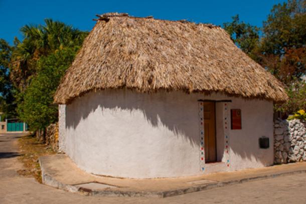 Many Maya on Mexico’s Yucatan Peninsula still dress, cook and live as their relatives have for millennia. A traditional home in Yucatan. Credit: Anna ART / Adobe Stock