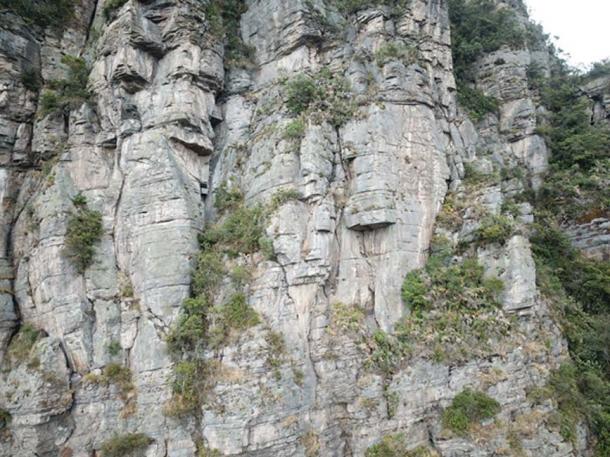 Many possible faces are visible in the cliff faces of Peña de Juaica