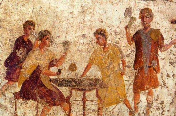 Men playing dice in Rome shown on a Pompeii fresco. (Public Domain)