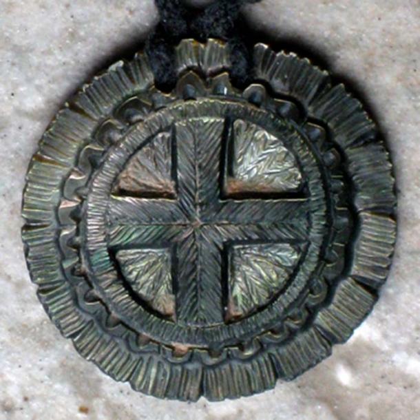 Miniature contemporary, cross-in-circle gorget by Dan Townsend (Muscogee Creek-Cherokee), Florida. (Public Domain)