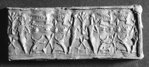 Mitannian Cylinder Seal with Two Heroes and a Tree.