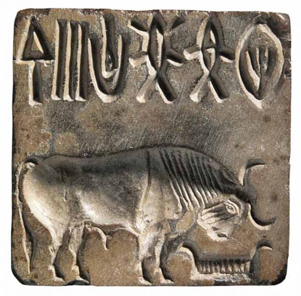 A stone seal from Mohenjo-Daro (Pakistan), similar to the ring found in Oman, with the same image of an Indian bison with the head lowered on a manger (Ministry of Heritage and Tourism, Sultanate of Oman)