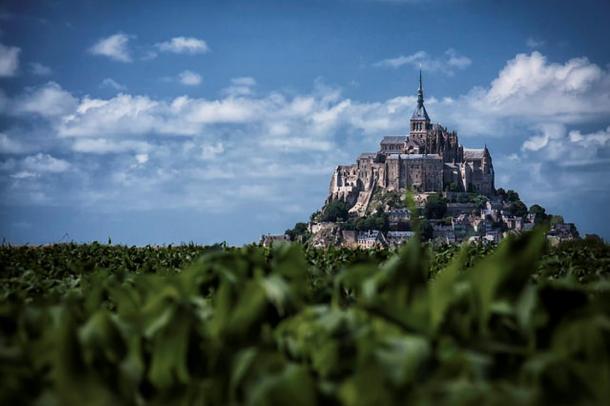 As if from an ancient legend, Mont St-Michel sits atop a rocky island in the ocean. 