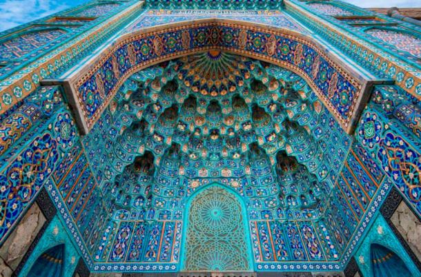 Mosaic decoration at the entrance of Saint Petersburg Mosque in Russia. It was built in the early 20th century, from 1909 to 1920, under the patronage of the last Russian tsar, Nicholas II, to honor the Muslim soldiers who fought for the Russian Empire. The mosque is known for its beautiful blue dome and minarets, and it continues to be an important site for the city's Muslim community. Source: mitzo_bs / Adobe Stock.