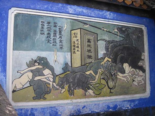 Mural in Fengdu Ghost City showing evil people falling to the underworld and being eaten by monsters.