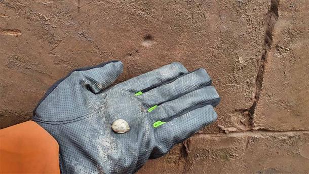 Musket ball impact on Coleshill Manor gatehouse and musket ball shot found below. Source: HS2