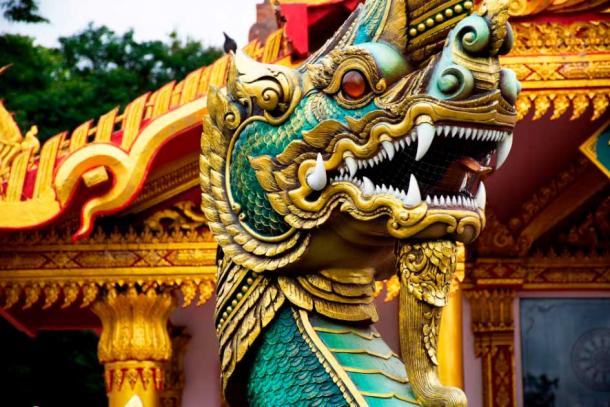 A Naga statue at the Wat Phra Kaew temple in Thailand. (tuayai / Adobe Stock)