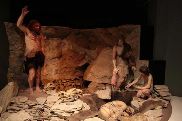 Reconstruction of Neanderthals burying an individual in a cave. National Museum of Natural History, Washington DC, USA. 
