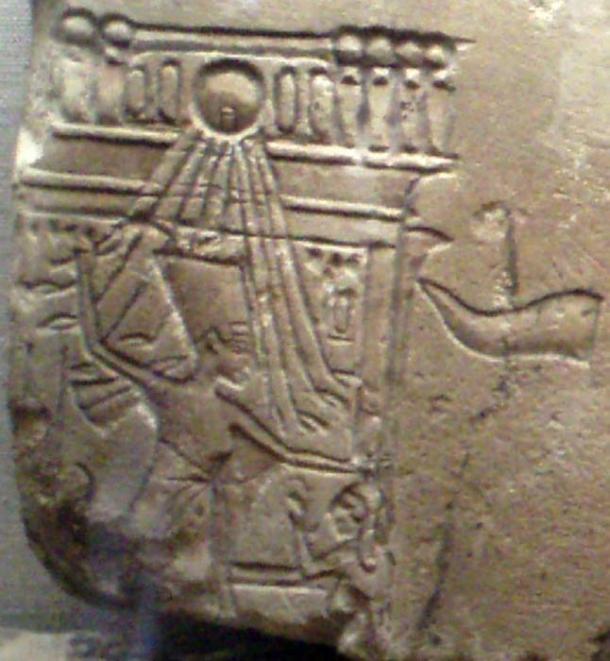 Nefertiti depicted in a familiar scene of a pharaoh smiting Egypt's enemy. 