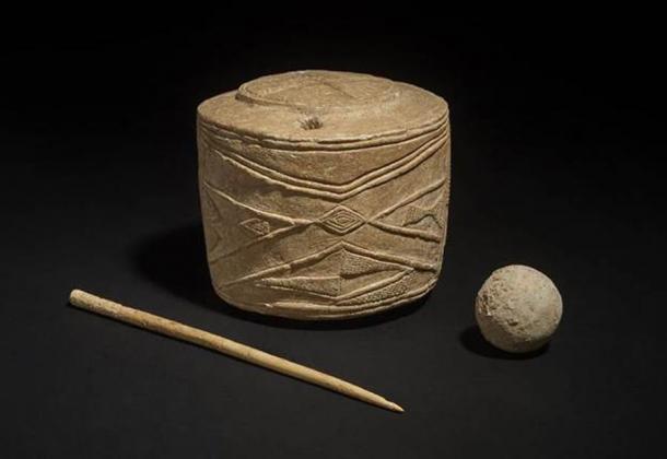 The Neolithic sculpture was found in an East Yorkshire grave, along with a bone pin and a chalk ball thought to be a child's toy.  Source: © Trustees of the British Museum