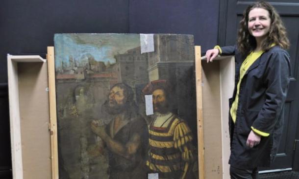 Nicky Grimaldi pictured with the panel painting from The Bowes Museum. (Northumbria University and Bowes Museum)