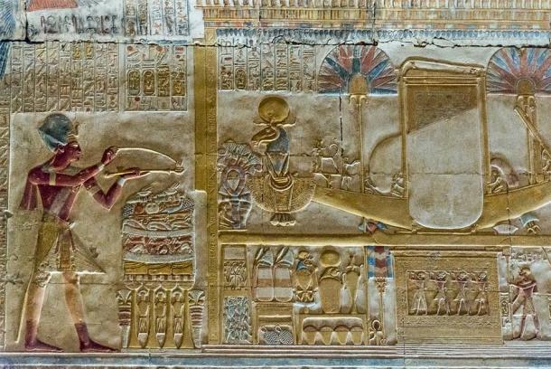 Note the Khnum figure with the solar disk on it’s head at the front of the sacred boat. Chapel of Amun-Ra, Temple of Seti I, Abydos. (kairoinfo4u/CC BY NC SA 2.0)