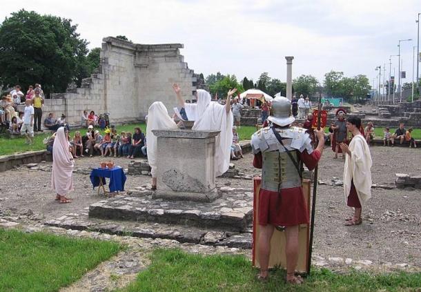 Members of Nova Roma conduct a Roman sacrifice to the goddess Concordia between the ruins of Aquincum, the modern city of Budapest, Hungary, during the Roman festival of Floralia, organized by the Aquincumi Múzeum. 