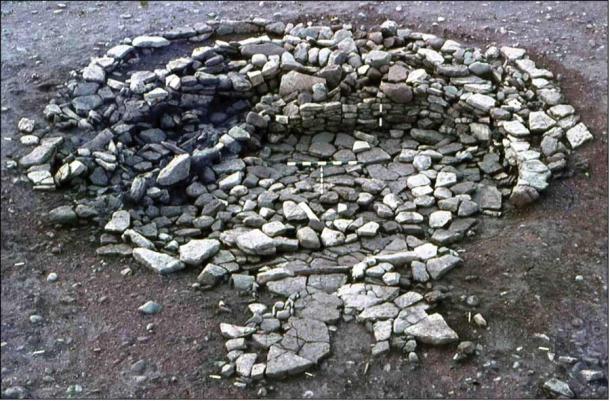 Objects including bone spoons, quernstones and gaming pieces were incorporated into the walls of this roundhouse at Broxmouth in NE Scotland in Iron Age Britain. (Broxmouth Project archive / Antiquities Publications Ltd)