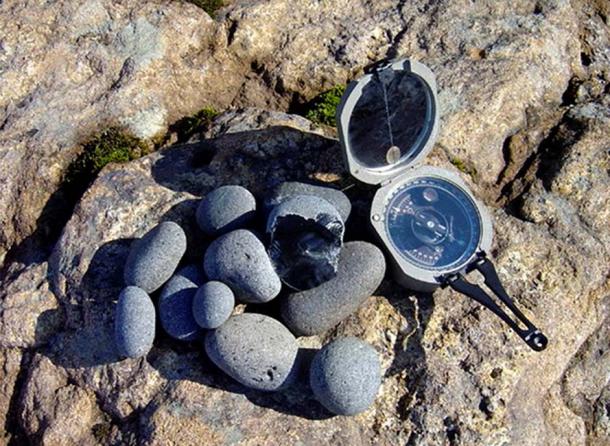 Obsidian pebbles found on the shored of the Lake Krasnoye. Image: Yaroslav Kuzmin