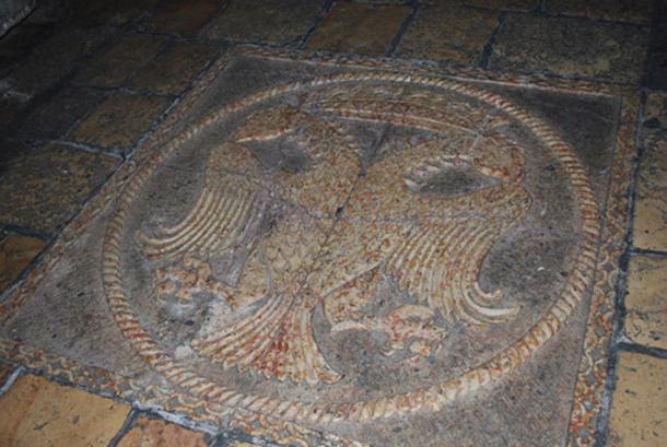 Old Jerusalem, Church of the Holy Sepulchre, Greek Orthodox chapel - Prison of Jesus. On the floor, in front of the chapel, is a mosaic figure of a crowned double headed eagle - symbol of the Byzantine empire and the Greek Orthodox church. 
