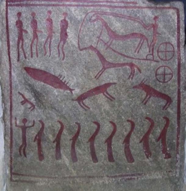 One of ten slabs of stone shows a horse drawn chariot with two four-spoked wheels