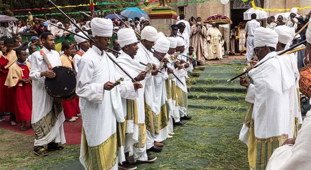 Orthodox Christian priests dancing in front of Saint Mary church for Timkat in Addis Ababa, Ethiopia. (Jean Rebiffé/CC BY 4.0)