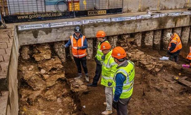 Oxford Archaeology and Beard construction workers standing in front of the limestone foundations of Oxford’s lost college, which King Henry VIII’s dissolution policies bankrupted. (Simon Gannon / Oxford Mail)