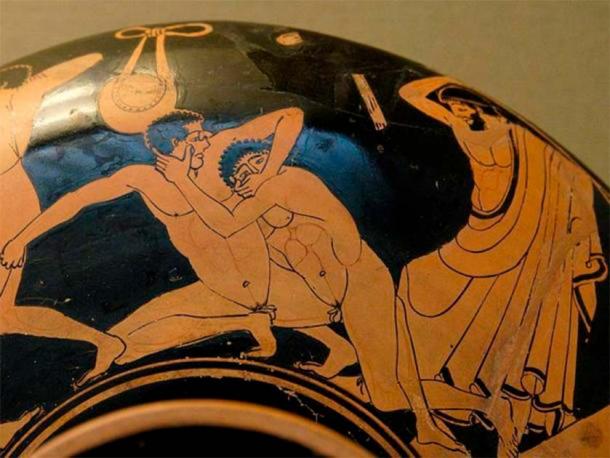 Pankration scene: The pankratiast on the right tries to gouge his opponent's eye; the umpire is about to strike him for this foul. British Museum, London. ( Public Domain )