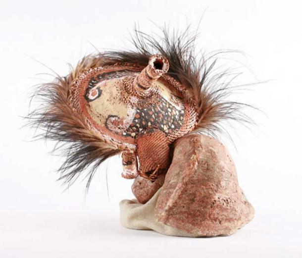 A Papuan feathered shell and basketry bride price.