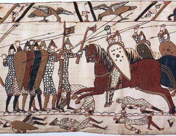 Part of scene 52 of the Bayeux Tapestry. This depicts mounted Normans attacking the Anglo-Saxon infantry. (Public Domain)